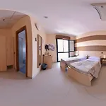 Bg *